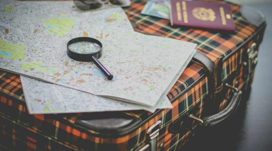 black magnifying glass on map