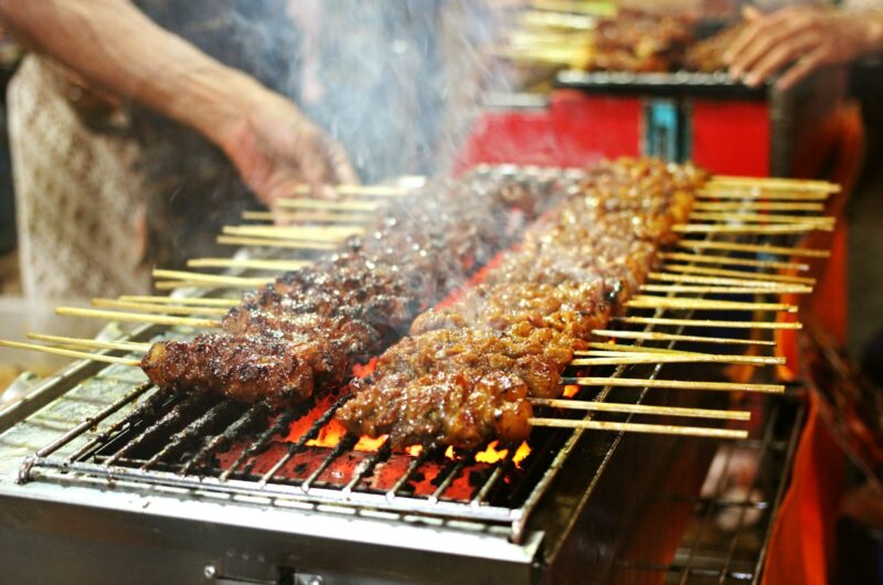 grilled meat on charcoal grill