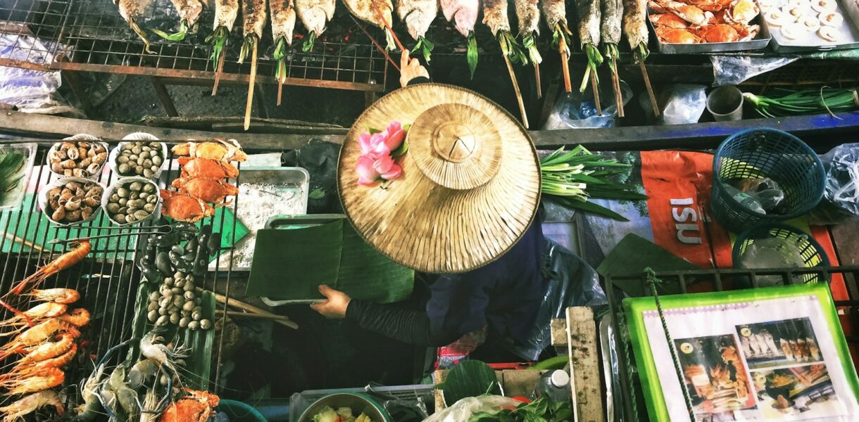 person wearing Asian conical hat