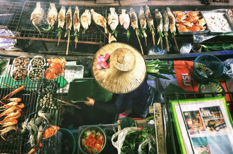 person wearing Asian conical hat