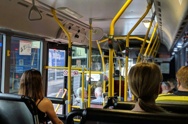 people sitting down inside vehicle