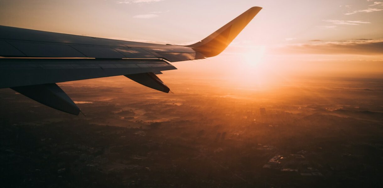 airplane on sky during golden hour