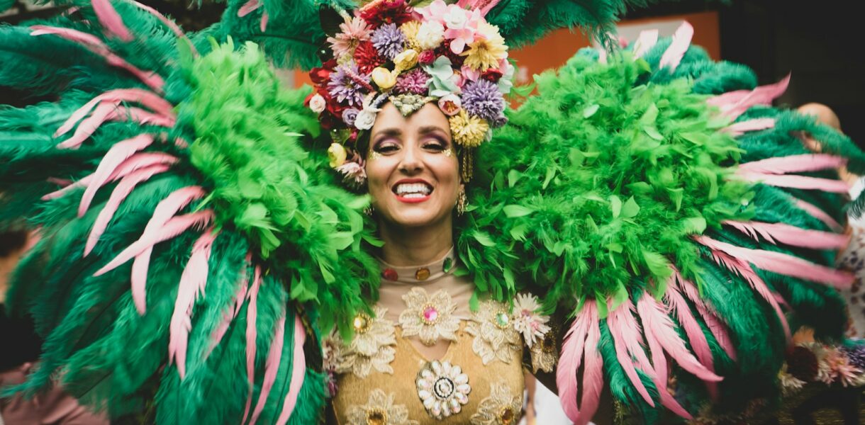 a woman in a green and pink costume