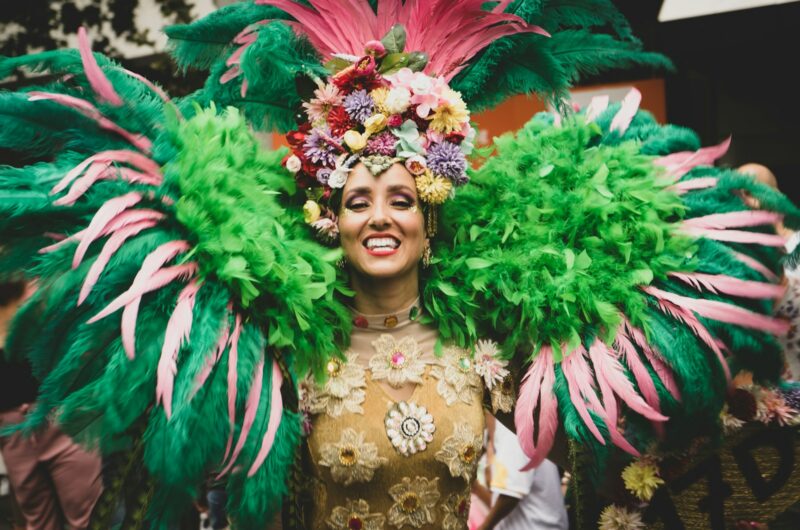 a woman in a green and pink costume