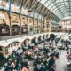 crowded people sitting on chair inside building